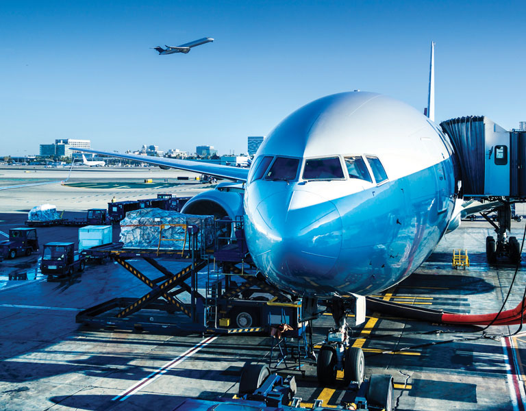 Commercial airliner refueling at airport